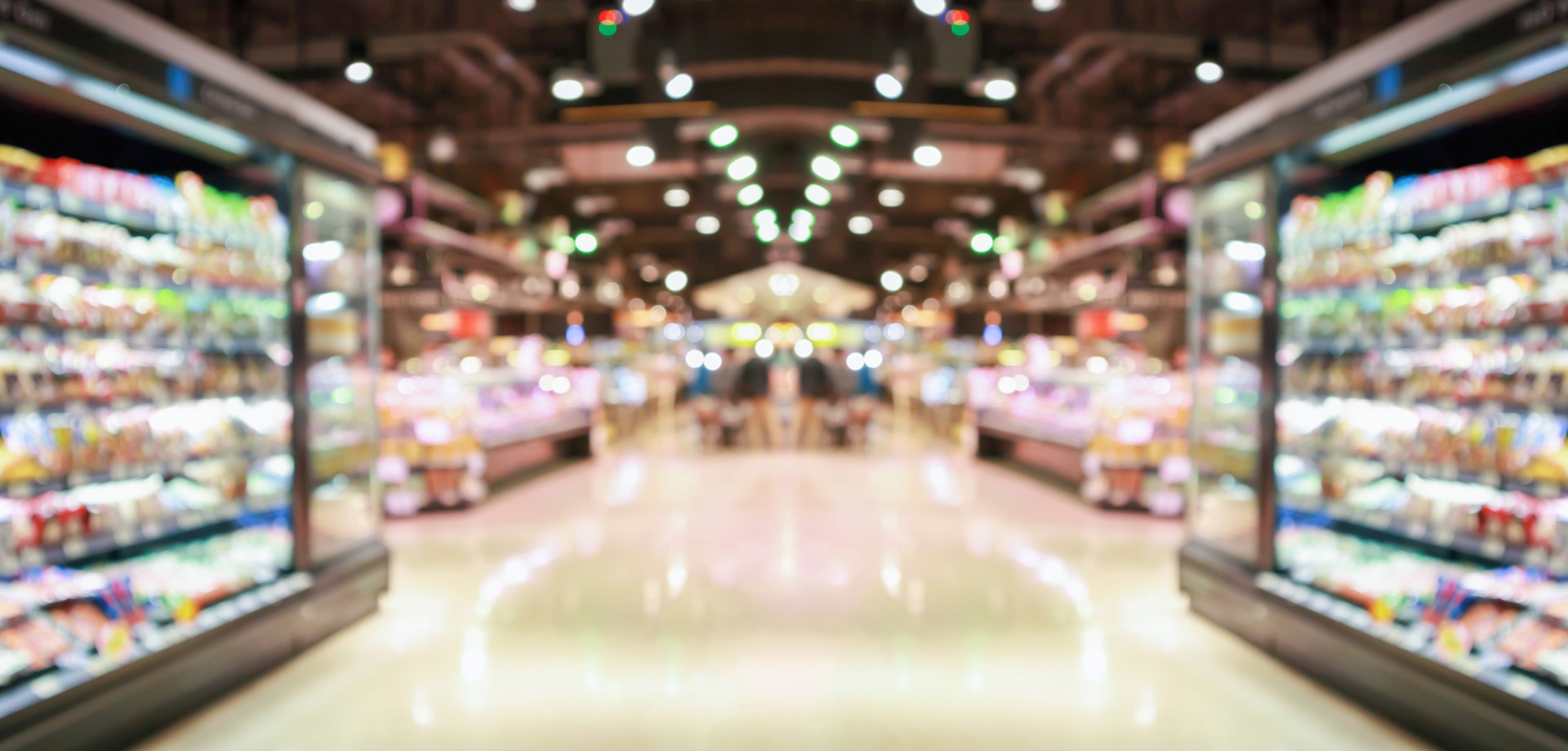 supermarket grocery store aisle and shelves blurred background